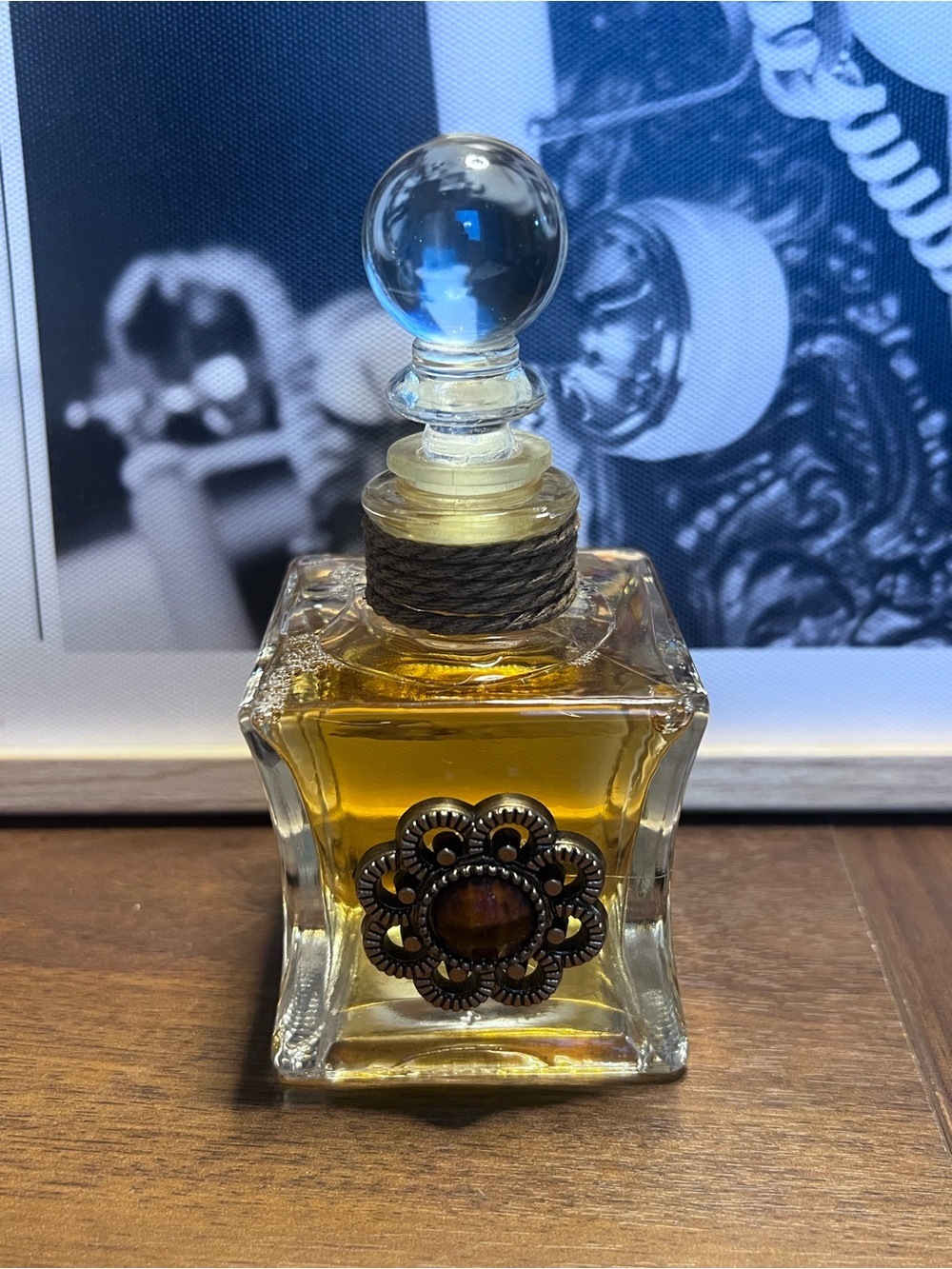 Amber Glass Decorative Fragrance Bottle with Ornate Medallion
